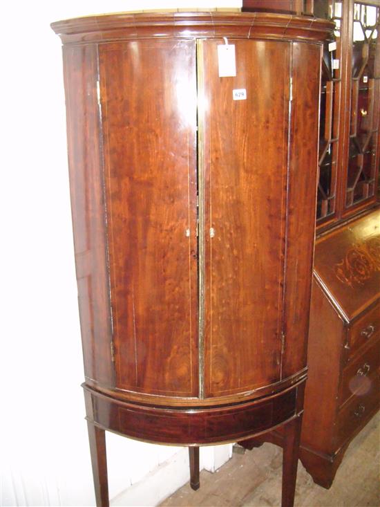 George III mahogany bow-fronted hanging corner cupboard on stand